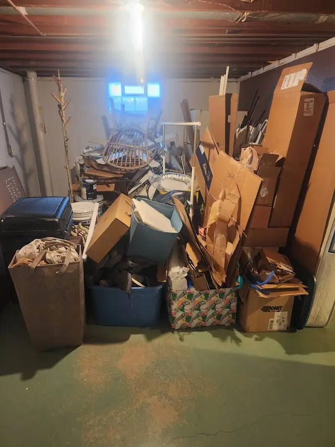 Roll-off dumpster container at job site for 8 Yard Dumpster Rental in Porters Neck